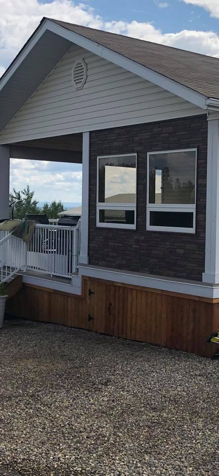Photo of outside of completed addition with siding.