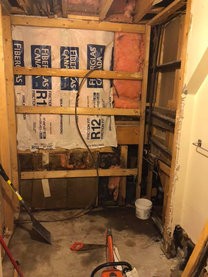 This bathroom was stripped down to reveal the damaged areas.